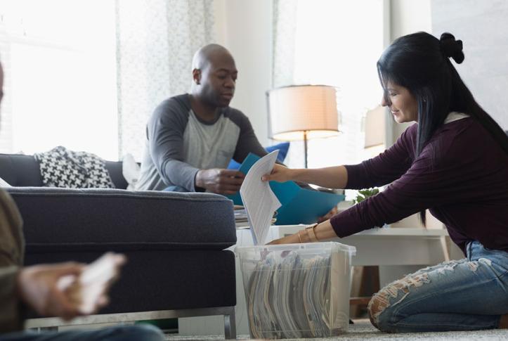 Family going thru bills for health insurance