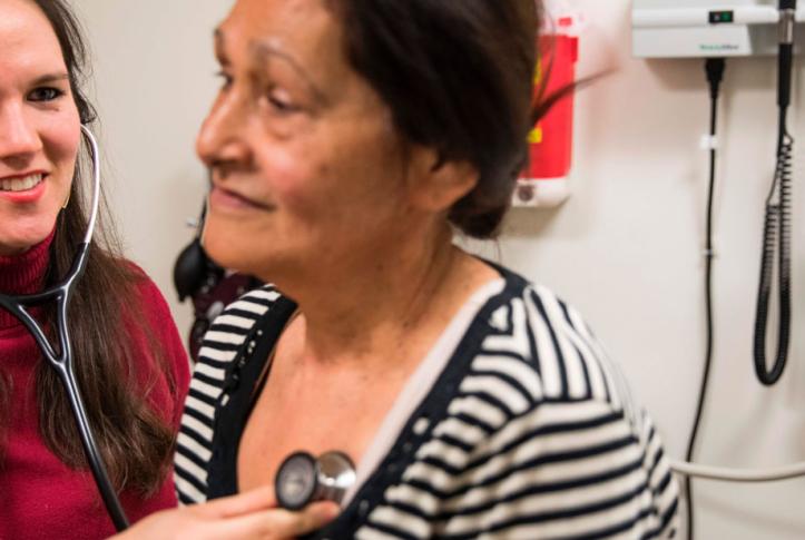 Nurse Katie Baker examines patient Mildred Arce at the Esperanza Health Center in Philadelphia, PA, on March 13, 2017. The center is located in North Philadelphia, the city with the highest rate of deep poverty people with incomes below half of the poverty line of any of the USAs 10 most populous cities, were a high rate of people do not have medical insurance coverage. DOMINICK REUTER/AFP via Getty Images