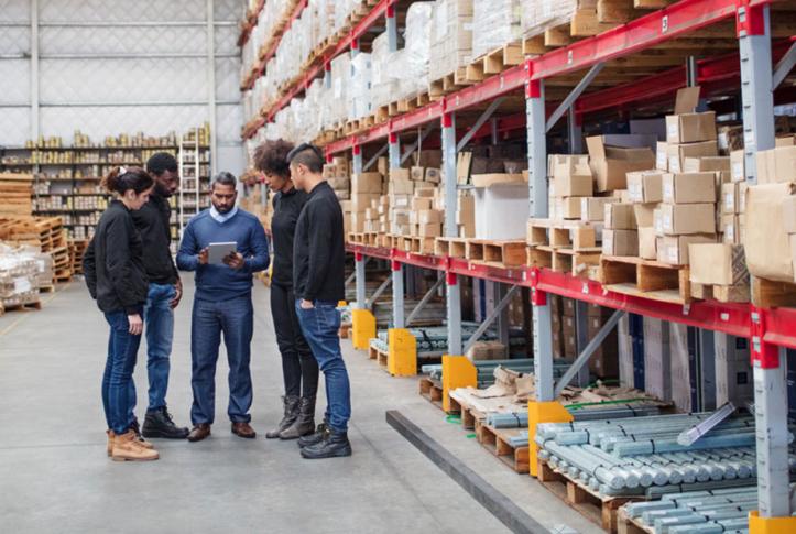 Small business meeting in warehouse