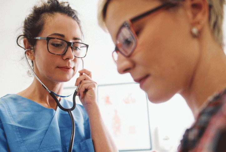 doctor examining Medicaid patient