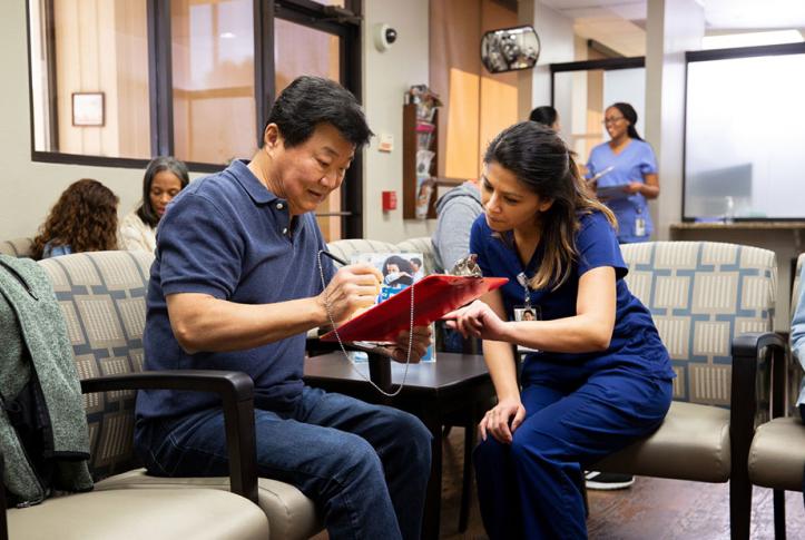 patient-gets-help-from-doctor-in-waiting-room