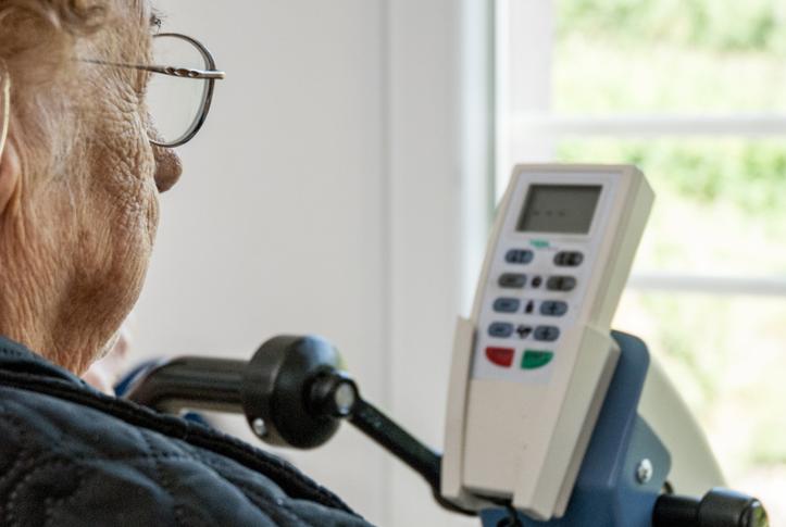 senior Medicare patient with hearing aid