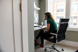 Woman on phone at desk